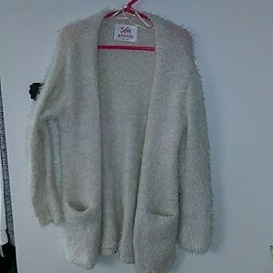 Lightweight shimmering long sleeved shrug